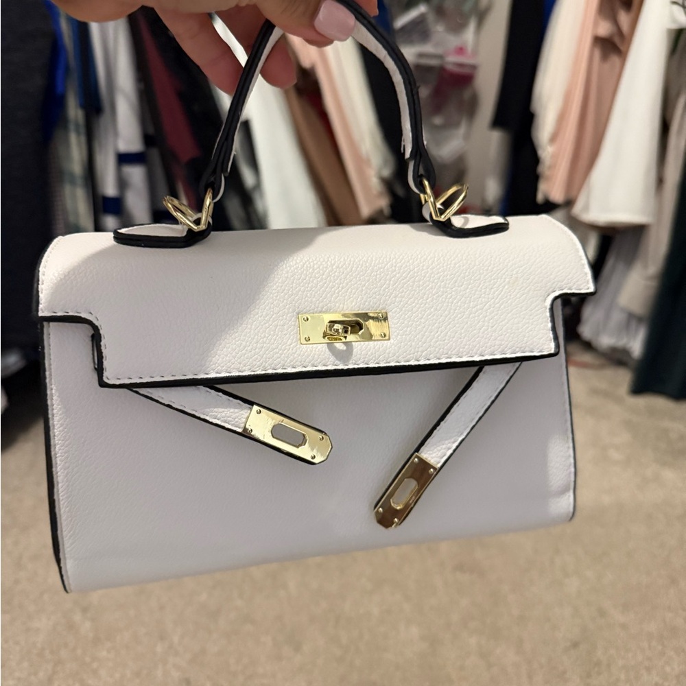 Elegant White Kelly bag with Gold Accents